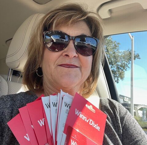 Tatje Insurance gives thanks by giving out Winn Dixie Cards.
